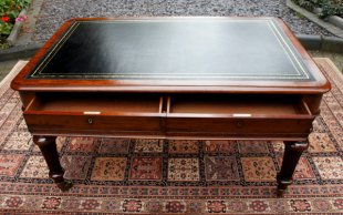 Antique Writing Table with leather writing surface.