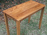 Reclaimed barn wood writing table with walnut accents