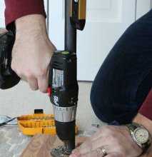 Attaching the pipe legs to a butcher block table top