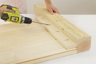 Securing the Panel in a DIY Bed Frame Project