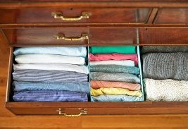 The dresser install, using a few shoeboxes. I even folded some of my husband’s striped shirts (on the left), just to inspire him to try this in his own drawers.